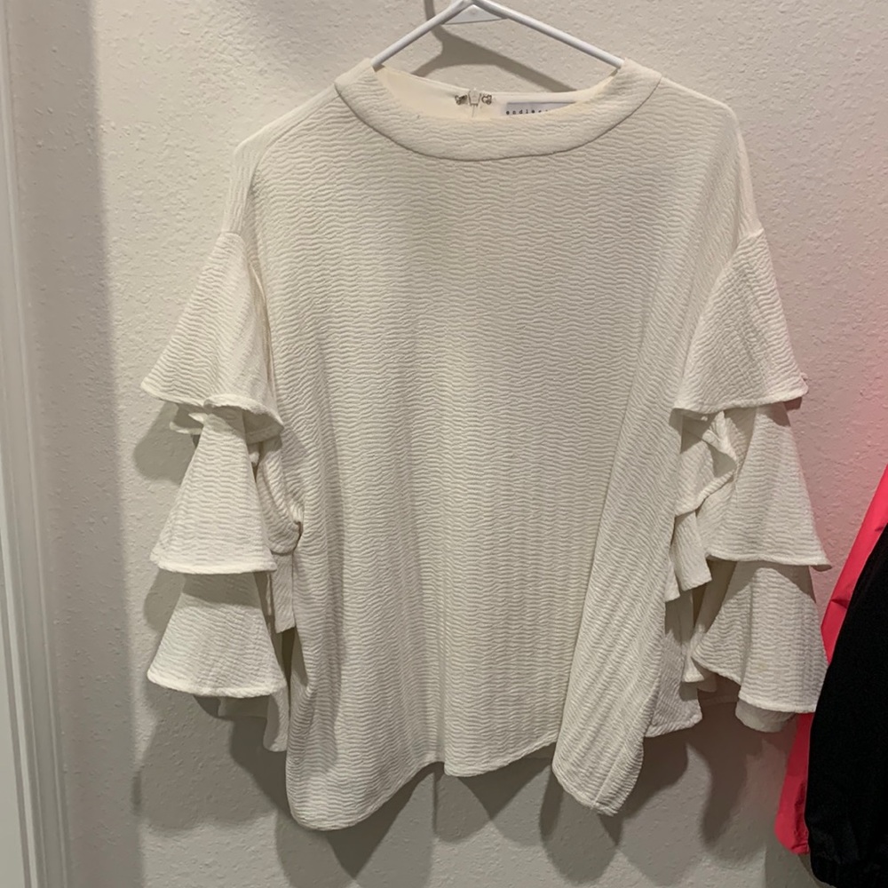 White flowy top